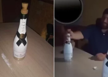 Captan al alcalde de Piaxtla brindando con champagne Moét